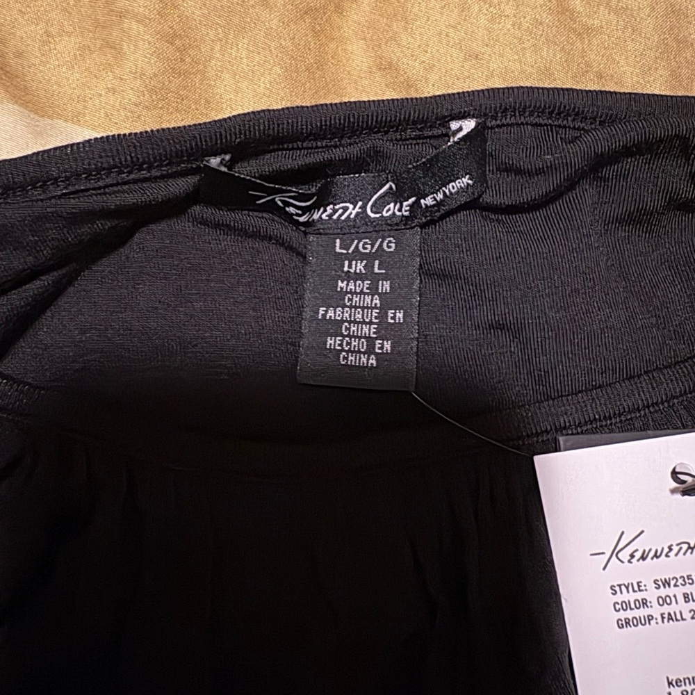 Kenneth Cole Elegant Black sleeveless blouse.